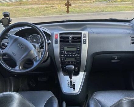 Зелений Хендай Туксон, об'ємом двигуна 1.98 л та пробігом 330 тис. км за 7000 $, фото 18 на Automoto.ua