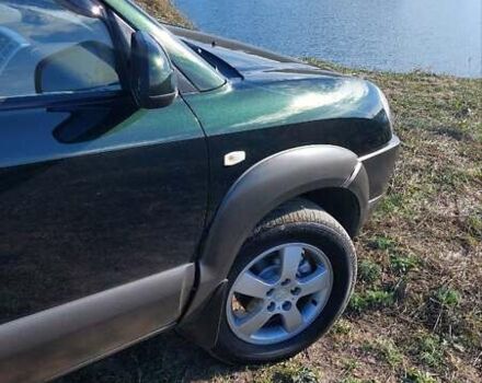 Зеленый Хендай Туксон, объемом двигателя 2 л и пробегом 137 тыс. км за 8500 $, фото 17 на Automoto.ua