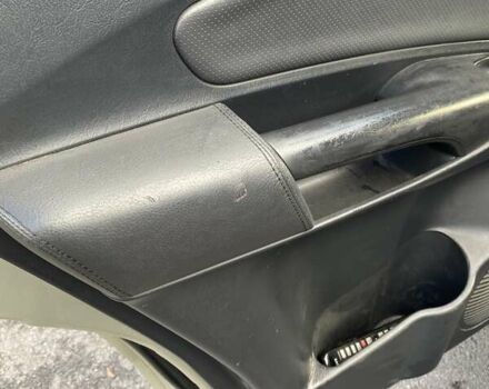 Зелений Хендай Туксон, об'ємом двигуна 1.98 л та пробігом 330 тис. км за 7000 $, фото 21 на Automoto.ua