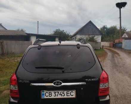 Зеленый Хендай Туксон, объемом двигателя 1.98 л и пробегом 310 тыс. км за 6200 $, фото 1 на Automoto.ua