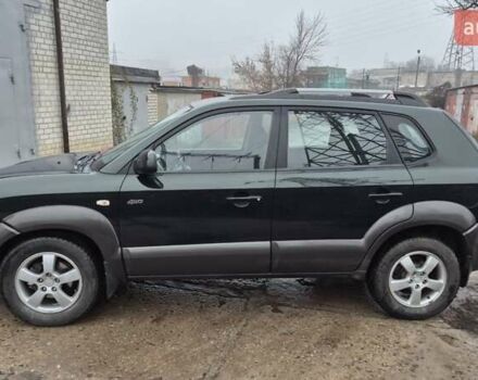 Зеленый Хендай Туксон, объемом двигателя 1.98 л и пробегом 241 тыс. км за 6900 $, фото 5 на Automoto.ua