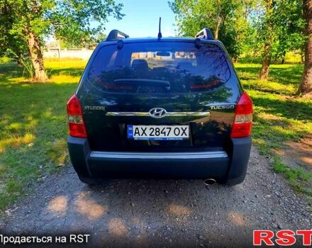 Зеленый Хендай Туксон, объемом двигателя 2 л и пробегом 210 тыс. км за 7699 $, фото 5 на Automoto.ua
