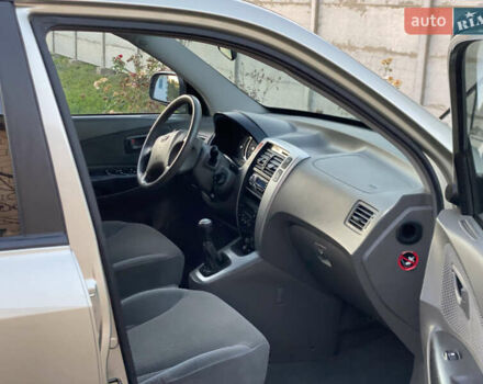 Зелений Хендай Туксон, об'ємом двигуна 1.99 л та пробігом 149 тис. км за 7300 $, фото 13 на Automoto.ua