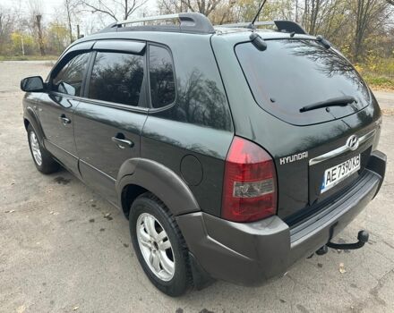 Зеленый Хендай Туксон, объемом двигателя 2.7 л и пробегом 250 тыс. км за 7850 $, фото 3 на Automoto.ua