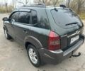 Зеленый Хендай Туксон, объемом двигателя 2.7 л и пробегом 250 тыс. км за 7850 $, фото 3 на Automoto.ua