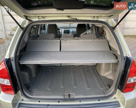 Зелений Хендай Туксон, об'ємом двигуна 1.99 л та пробігом 149 тис. км за 7300 $, фото 14 на Automoto.ua