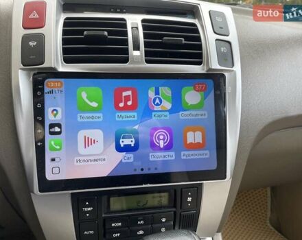 Зелений Хендай Туксон, об'ємом двигуна 2 л та пробігом 211 тис. км за 7400 $, фото 12 на Automoto.ua