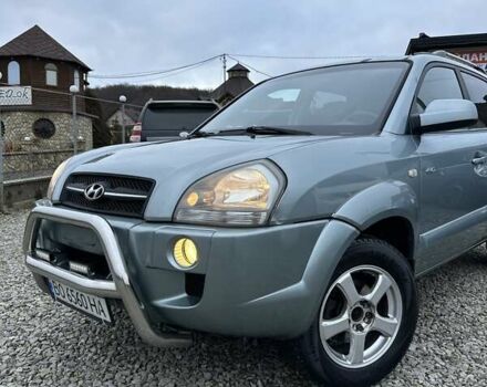 Зеленый Хендай Туксон, объемом двигателя 2 л и пробегом 190 тыс. км за 8450 $, фото 4 на Automoto.ua