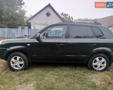 Зеленый Хендай Туксон, объемом двигателя 1.98 л и пробегом 310 тыс. км за 6200 $, фото 8 на Automoto.ua