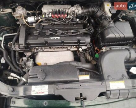 Зеленый Хендай Туксон, объемом двигателя 1.98 л и пробегом 310 тыс. км за 6200 $, фото 14 на Automoto.ua