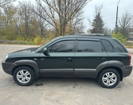 Зеленый Хендай Туксон, объемом двигателя 2.7 л и пробегом 250 тыс. км за 7850 $, фото 2 на Automoto.ua