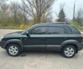 Зеленый Хендай Туксон, объемом двигателя 2.7 л и пробегом 250 тыс. км за 7850 $, фото 2 на Automoto.ua