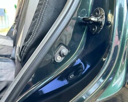 Зелений Хендай Туксон, об'ємом двигуна 1.98 л та пробігом 188 тис. км за 7900 $, фото 6 на Automoto.ua