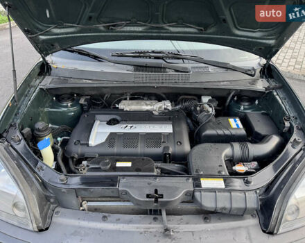 Зеленый Хендай Туксон, объемом двигателя 2 л и пробегом 221 тыс. км за 8199 $, фото 27 на Automoto.ua