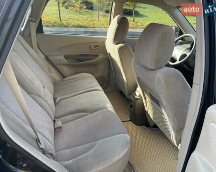 Зеленый Хендай Туксон, объемом двигателя 1.99 л и пробегом 208 тыс. км за 7600 $, фото 10 на Automoto.ua