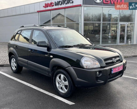 Зеленый Хендай Туксон, объемом двигателя 2 л и пробегом 221 тыс. км за 8199 $, фото 3 на Automoto.ua
