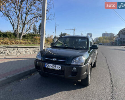 Зеленый Хендай Туксон, объемом двигателя 1.99 л и пробегом 208 тыс. км за 7600 $, фото 1 на Automoto.ua