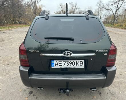 Зеленый Хендай Туксон, объемом двигателя 2.7 л и пробегом 250 тыс. км за 7850 $, фото 4 на Automoto.ua