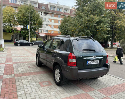 Зеленый Хендай Туксон, объемом двигателя 1.99 л и пробегом 205 тыс. км за 7300 $, фото 4 на Automoto.ua
