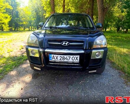 Зеленый Хендай Туксон, объемом двигателя 2 л и пробегом 210 тыс. км за 7699 $, фото 2 на Automoto.ua