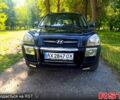 Зеленый Хендай Туксон, объемом двигателя 2 л и пробегом 210 тыс. км за 7699 $, фото 2 на Automoto.ua