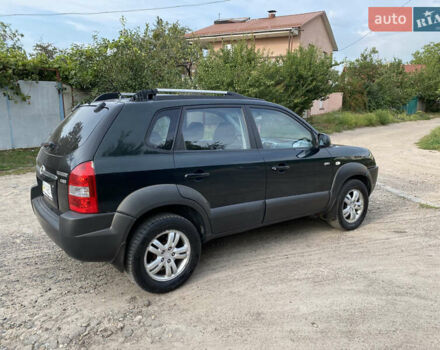 Зелений Хендай Туксон, об'ємом двигуна 2 л та пробігом 300 тис. км за 5850 $, фото 10 на Automoto.ua