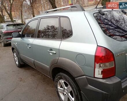 Зелений Хендай Туксон, об'ємом двигуна 1.99 л та пробігом 218 тис. км за 6500 $, фото 9 на Automoto.ua
