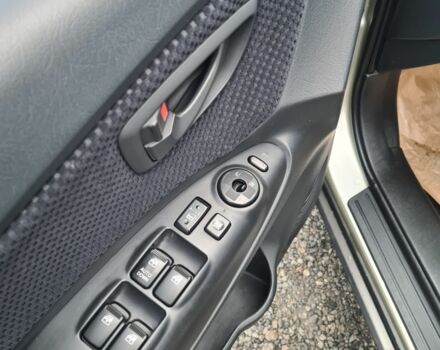 Зелений Хендай Туксон, об'ємом двигуна 2 л та пробігом 149 тис. км за 9900 $, фото 10 на Automoto.ua