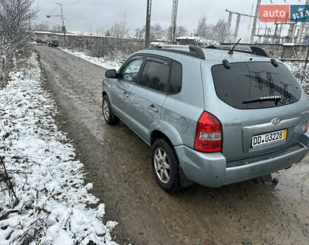 Зелений Хендай Туксон, об'ємом двигуна 2 л та пробігом 248 тис. км за 6999 $, фото 7 на Automoto.ua