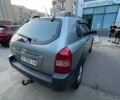 Зеленый Хендай Туксон, объемом двигателя 1.98 л и пробегом 205 тыс. км за 7700 $, фото 3 на Automoto.ua