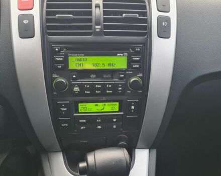 Зелений Хендай Туксон, об'ємом двигуна 2 л та пробігом 149 тис. км за 9900 $, фото 3 на Automoto.ua