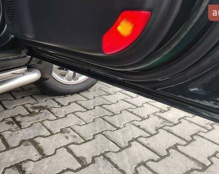 Зелений Хендай Туксон, об'ємом двигуна 1.98 л та пробігом 245 тис. км за 7800 $, фото 20 на Automoto.ua