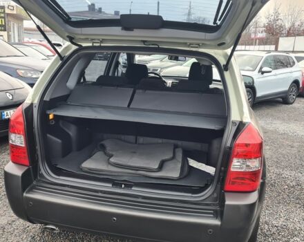 Зелений Хендай Туксон, об'ємом двигуна 2 л та пробігом 149 тис. км за 9900 $, фото 2 на Automoto.ua