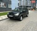 Зеленый Хендай Туксон, объемом двигателя 2 л и пробегом 82 тыс. км за 9950 $, фото 1 на Automoto.ua
