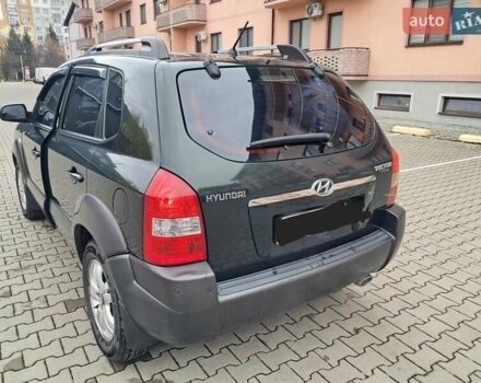 Зеленый Хендай Туксон, объемом двигателя 1.98 л и пробегом 280 тыс. км за 7200 $, фото 4 на Automoto.ua