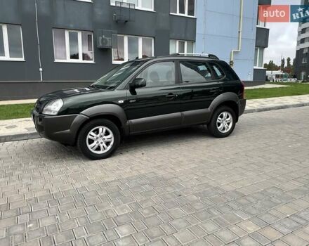 Зеленый Хендай Туксон, объемом двигателя 2 л и пробегом 82 тыс. км за 9950 $, фото 3 на Automoto.ua
