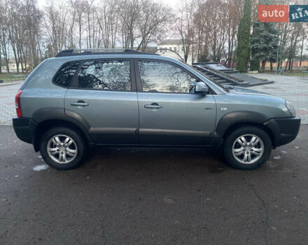 Зеленый Хендай Туксон, объемом двигателя 2 л и пробегом 223 тыс. км за 7950 $, фото 6 на Automoto.ua