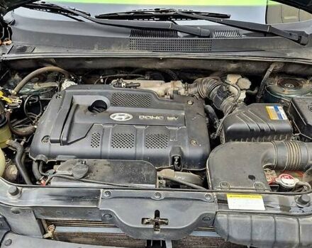 Зелений Хендай Туксон, об'ємом двигуна 2 л та пробігом 276 тис. км за 9000 $, фото 8 на Automoto.ua