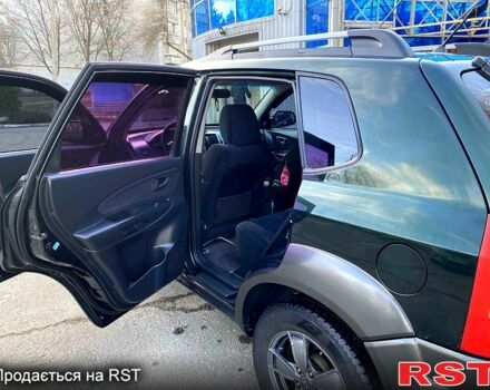 Зелений Хендай Туксон, об'ємом двигуна 2 л та пробігом 236 тис. км за 7600 $, фото 2 на Automoto.ua