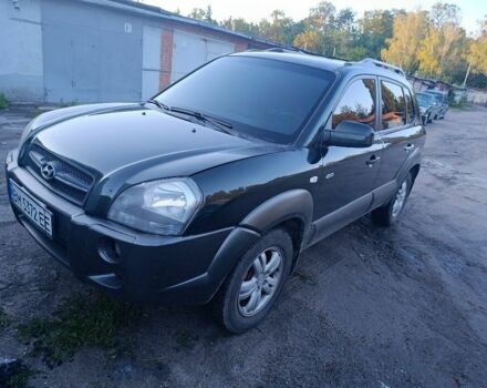 Зеленый Хендай Туксон, объемом двигателя 2 л и пробегом 189 тыс. км за 8500 $, фото 2 на Automoto.ua