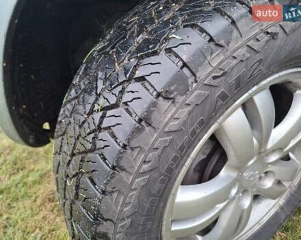 Зеленый Хендай Туксон, объемом двигателя 1.98 л и пробегом 129 тыс. км за 9200 $, фото 16 на Automoto.ua