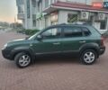 Зеленый Хендай Туксон, объемом двигателя 2 л и пробегом 225 тыс. км за 6100 $, фото 3 на Automoto.ua
