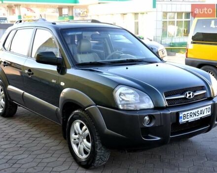 Зеленый Хендай Туксон, объемом двигателя 1.98 л и пробегом 245 тыс. км за 7200 $, фото 5 на Automoto.ua