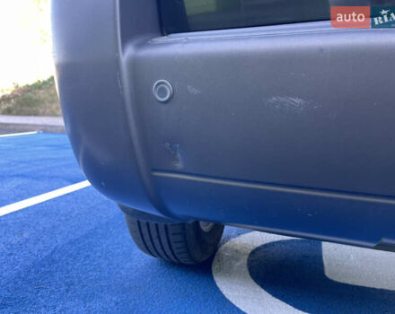 Зеленый Хендай Туксон, объемом двигателя 1.98 л и пробегом 195 тыс. км за 8000 $, фото 25 на Automoto.ua