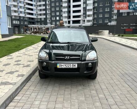 Зеленый Хендай Туксон, объемом двигателя 2 л и пробегом 82 тыс. км за 9950 $, фото 1 на Automoto.ua