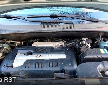 Зелений Хендай Туксон, об'ємом двигуна 2 л та пробігом 227 тис. км за 7800 $, фото 9 на Automoto.ua