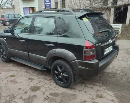 Зеленый Хендай Туксон, объемом двигателя 2 л и пробегом 213 тыс. км за 6500 $, фото 4 на Automoto.ua
