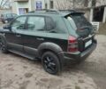 Зеленый Хендай Туксон, объемом двигателя 2 л и пробегом 213 тыс. км за 6500 $, фото 4 на Automoto.ua