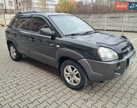 Зеленый Хендай Туксон, объемом двигателя 1.98 л и пробегом 280 тыс. км за 7200 $, фото 10 на Automoto.ua