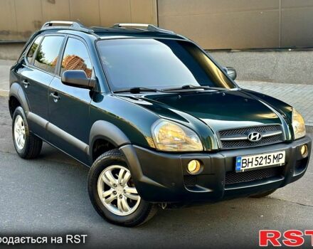 Зеленый Хендай Туксон, объемом двигателя 2 л и пробегом 172 тыс. км за 7000 $, фото 3 на Automoto.ua